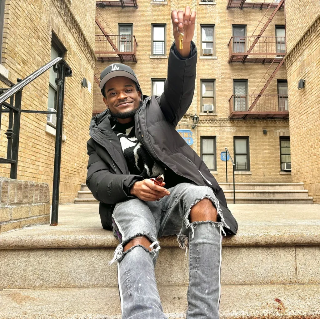 A community member celebrating outdoors